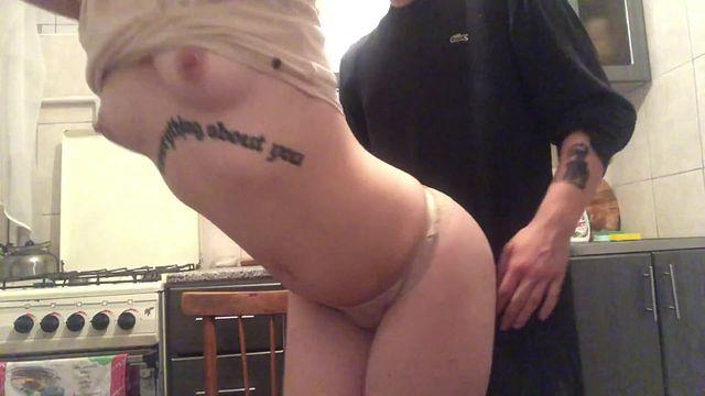DATEZONE - Amateur blonde blows and gets fucked doggystyle in the kitchen.jpg